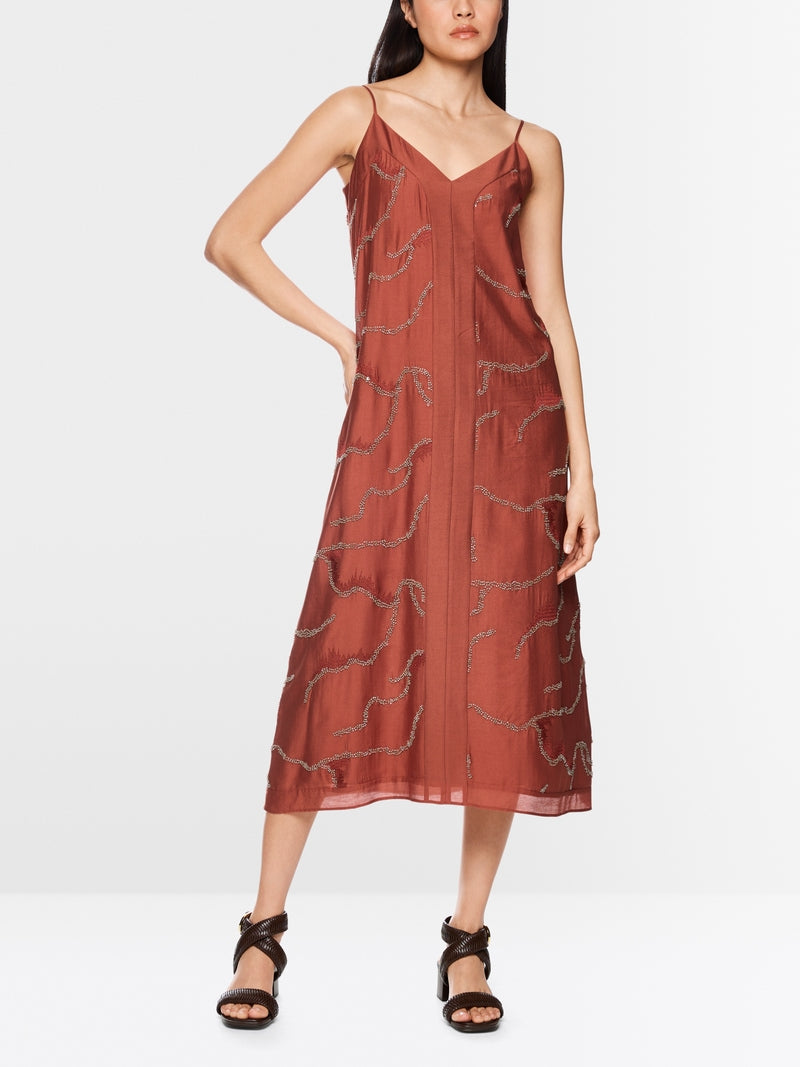 Vestido com pequenas pérolas