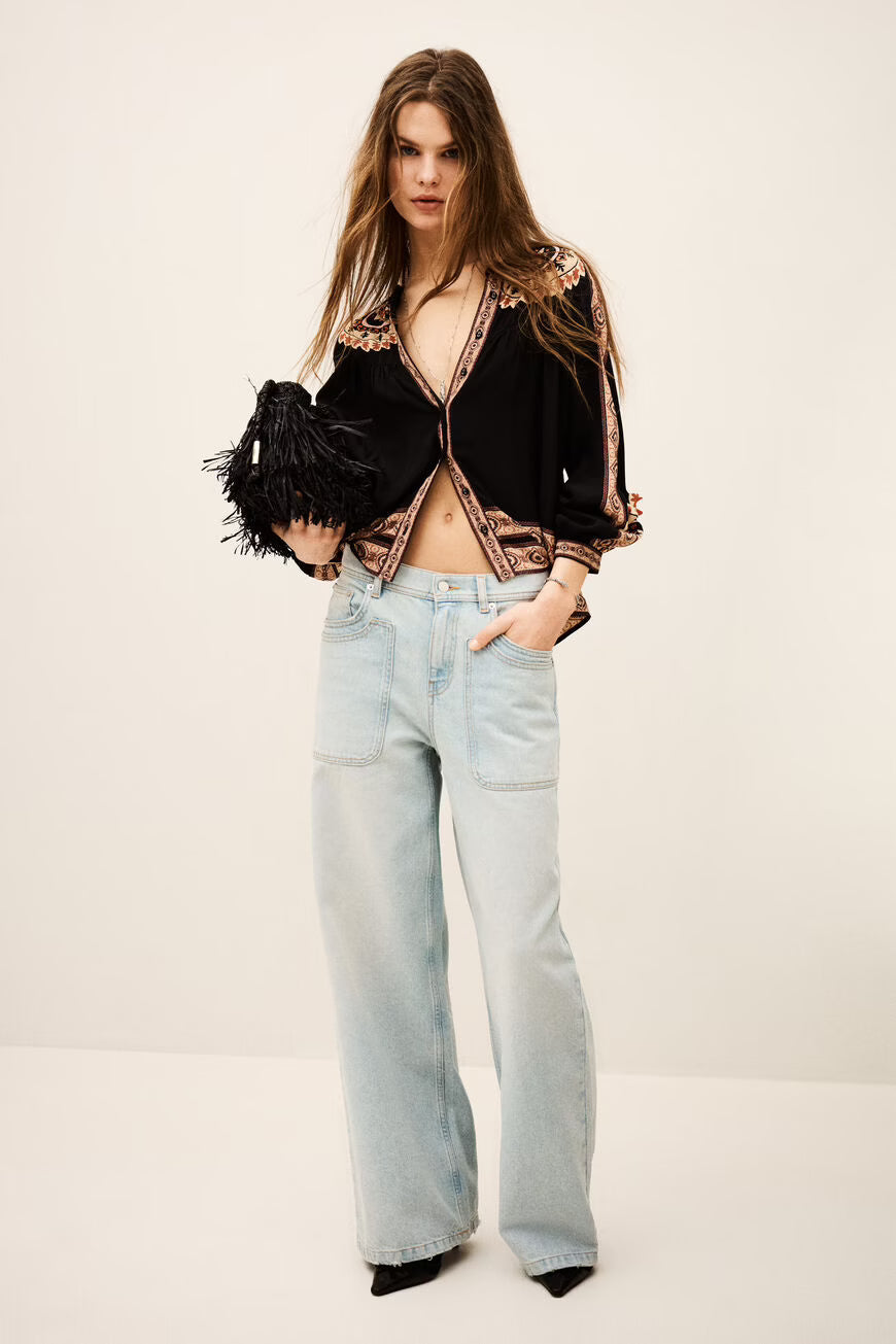 Blusa estampada e larga