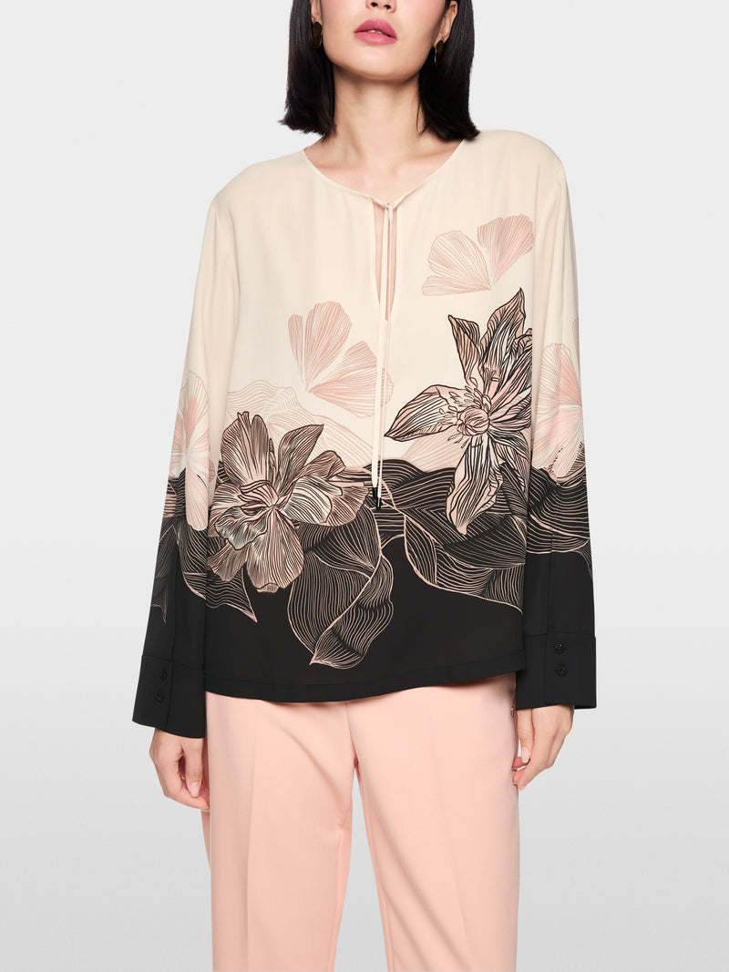 Blusa fluida com estampado floral