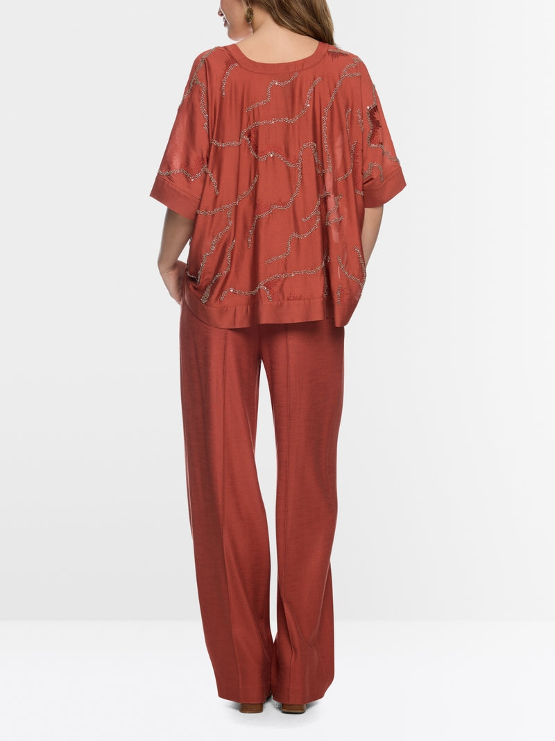 Blusa com pequenas pérolas
